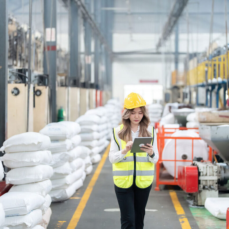 Manufacturing employee aisle-shutterstock_2462305937-crop